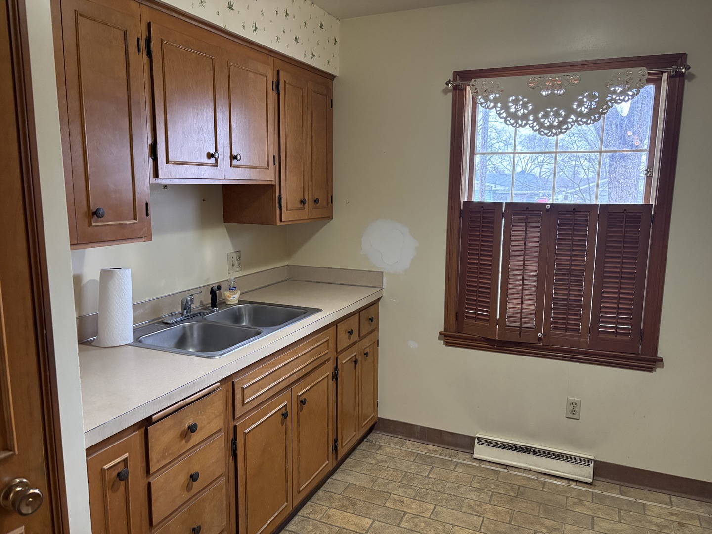 1740 Frazier Avenue Centralia, IL 62801 - Photo 9 of 12 a kitchen with stainless steel appliances granite countertop a sink and a microwave