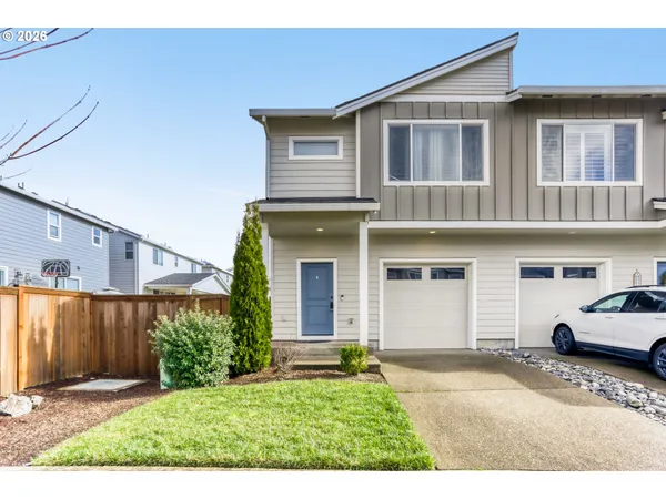 a house view with a garden space