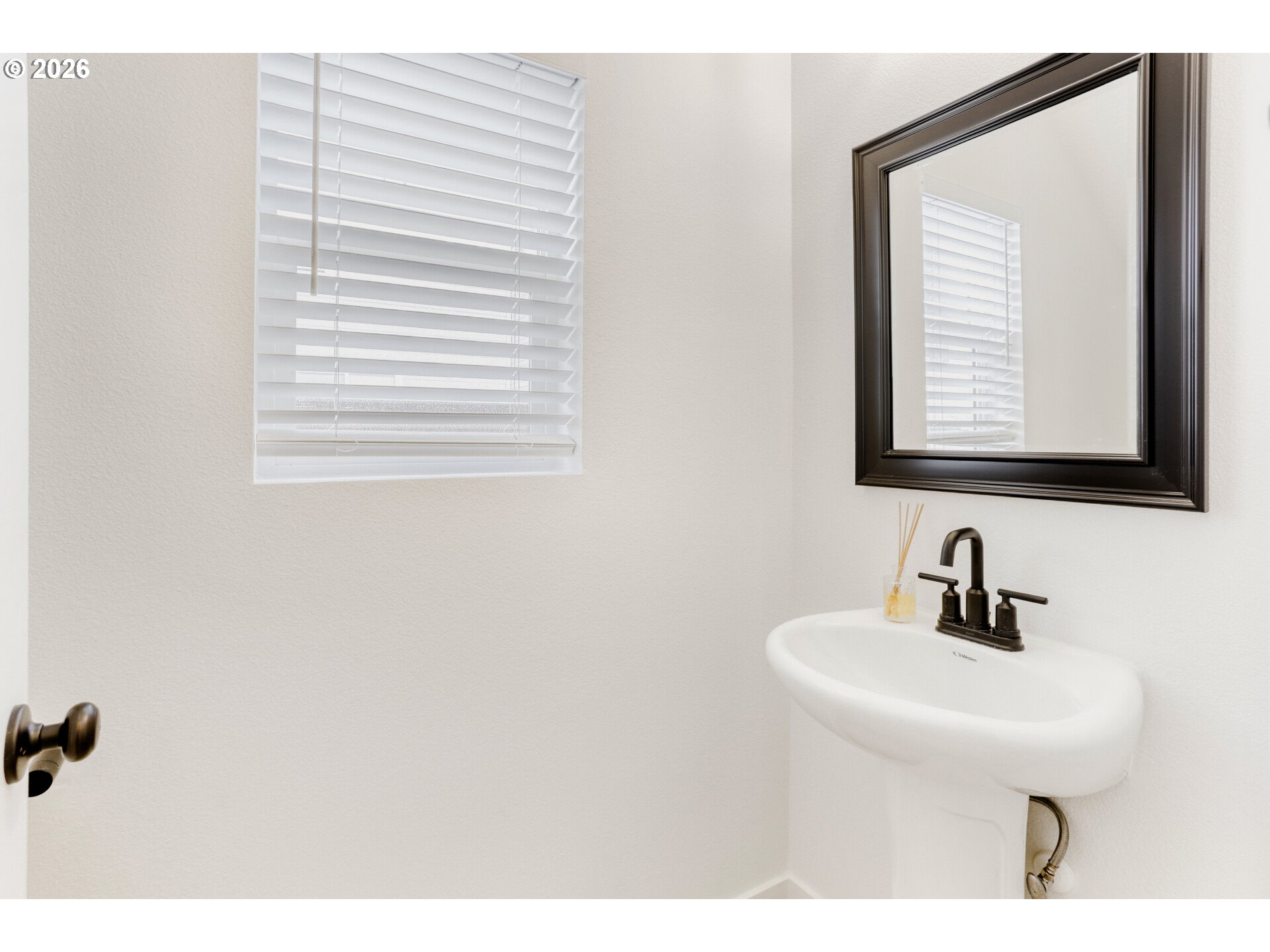 802 South 25th Avenue Cornelius, OR 97113 - Photo 15 of 30 a bathroom with a sink and a mirror