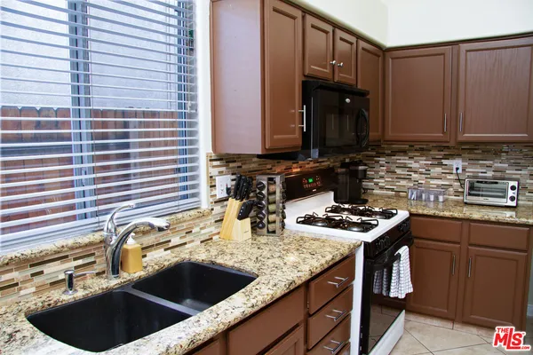 a kitchen with a sink and a cabinets