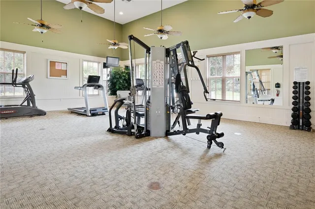 an aerial view of a house with a lake view