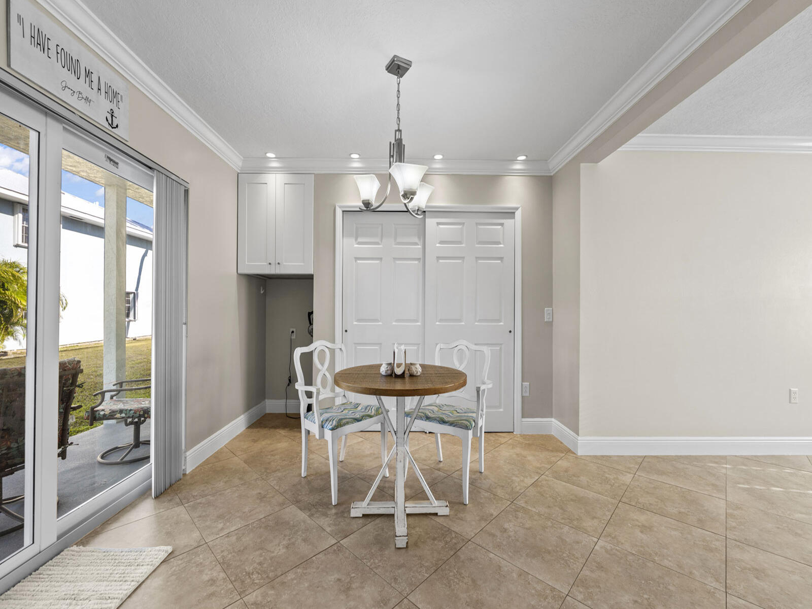 40 High Point Road, Unit D102 Tavernier, FL 33070 - Photo 12 of 37 a view of a dining room with furniture and chandelier