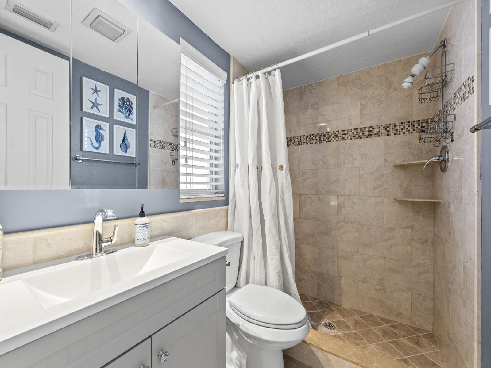 40 High Point Road, Unit D102 Tavernier, FL 33070 - Photo 21 of 37 a bathroom with a sink toilet and shower