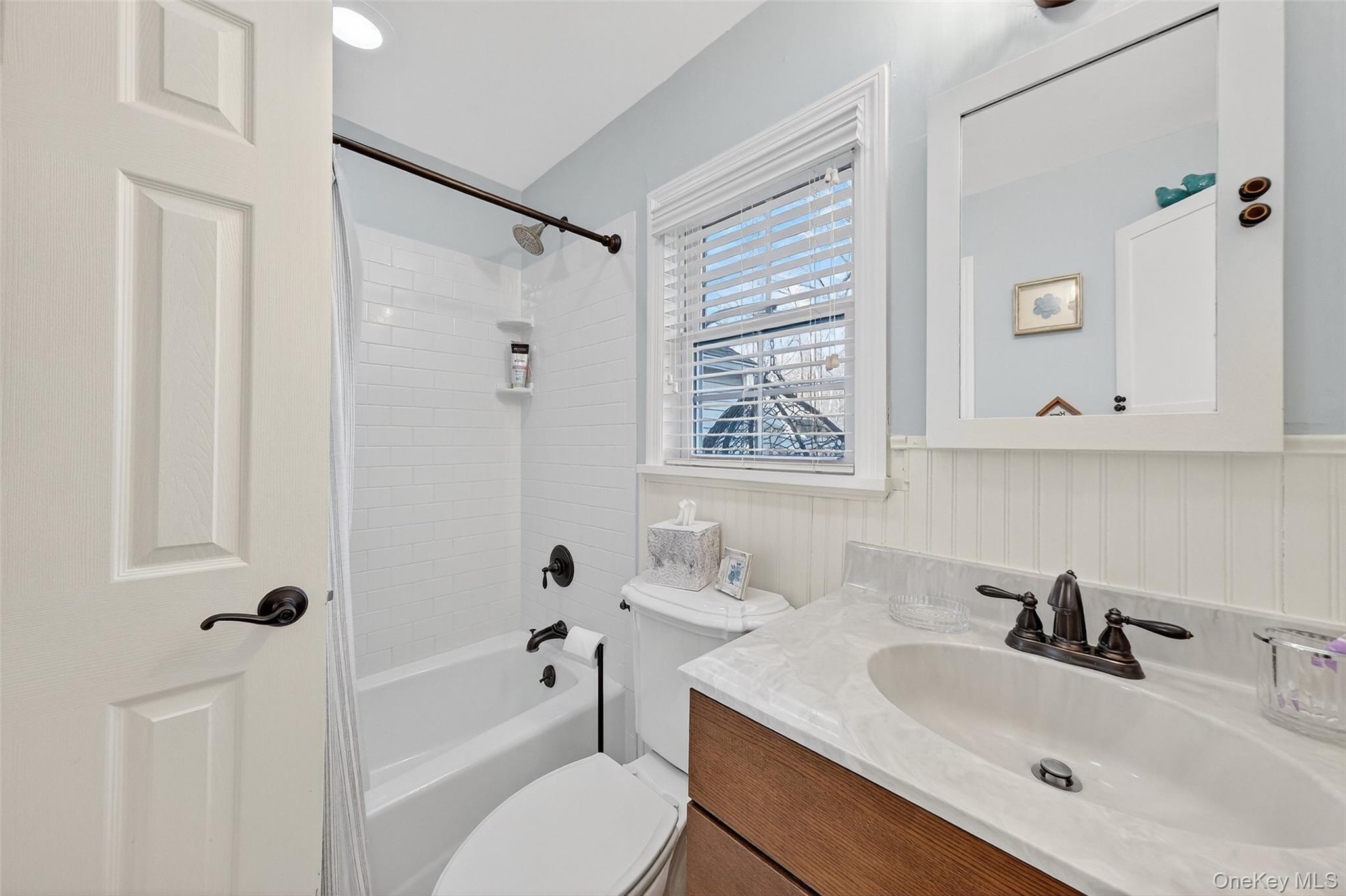 550 Beach Road Mahopac, NY 10541 - Photo 19 of 38 a bathroom with a sink toilet tub and shower