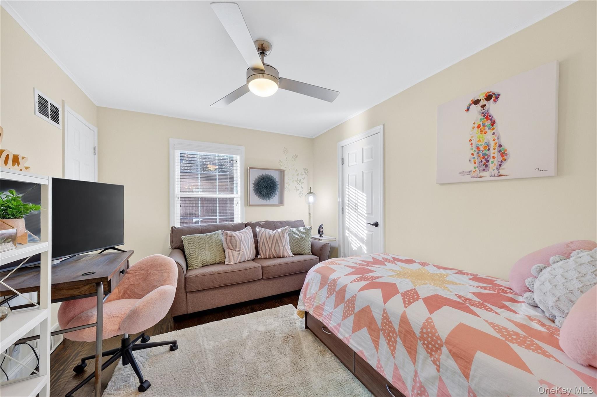 550 Beach Road Mahopac, NY 10541 - Photo 20 of 38 a bedroom with a bed and a couch