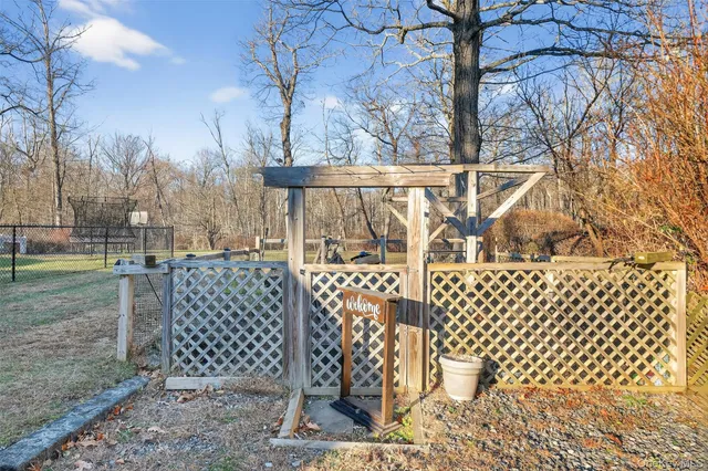 a view of a wrought iron fences in front of house