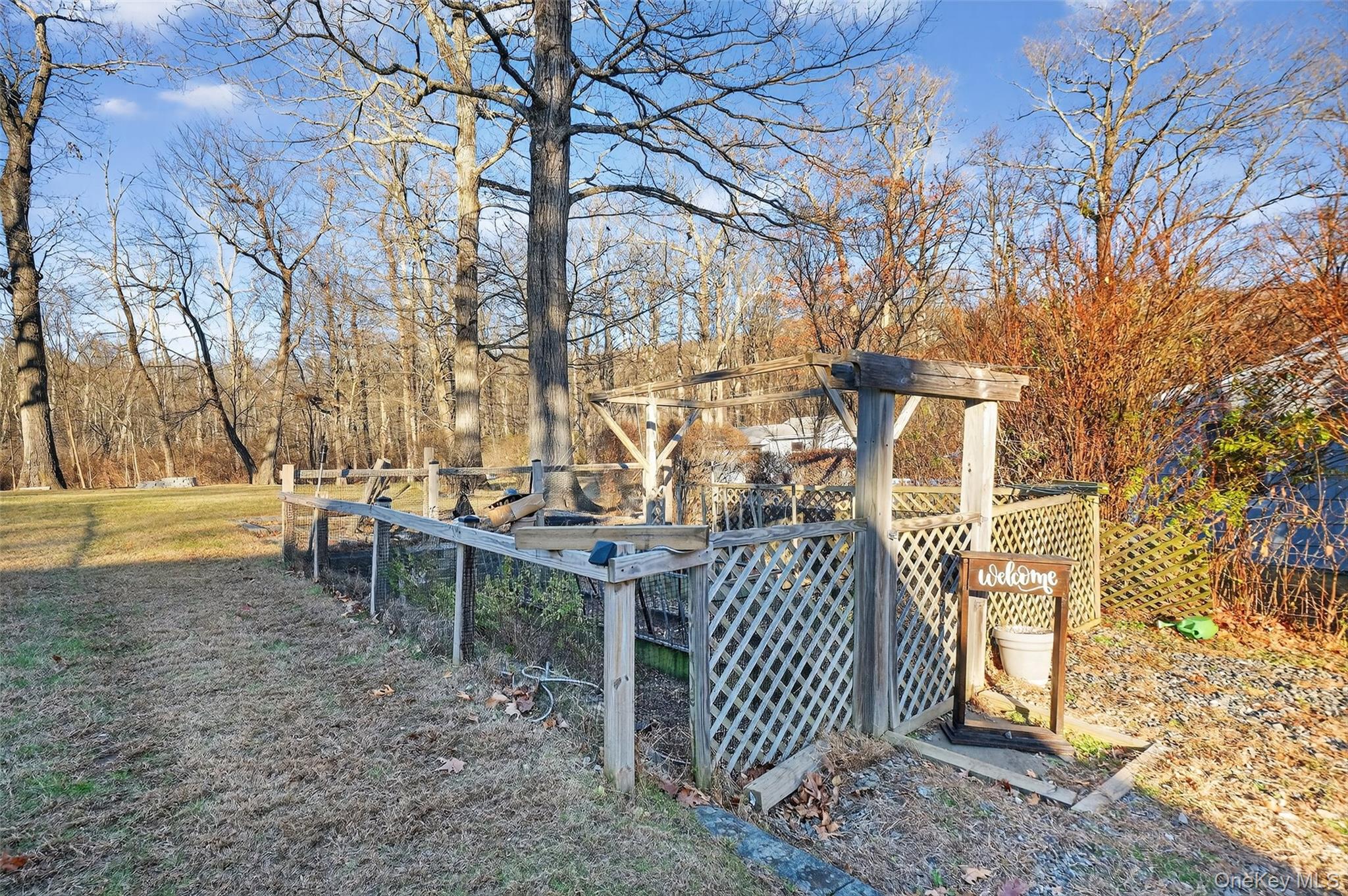 550 Beach Road Mahopac, NY 10541 - Photo 31 of 38 a backyard of a house with table and chairs