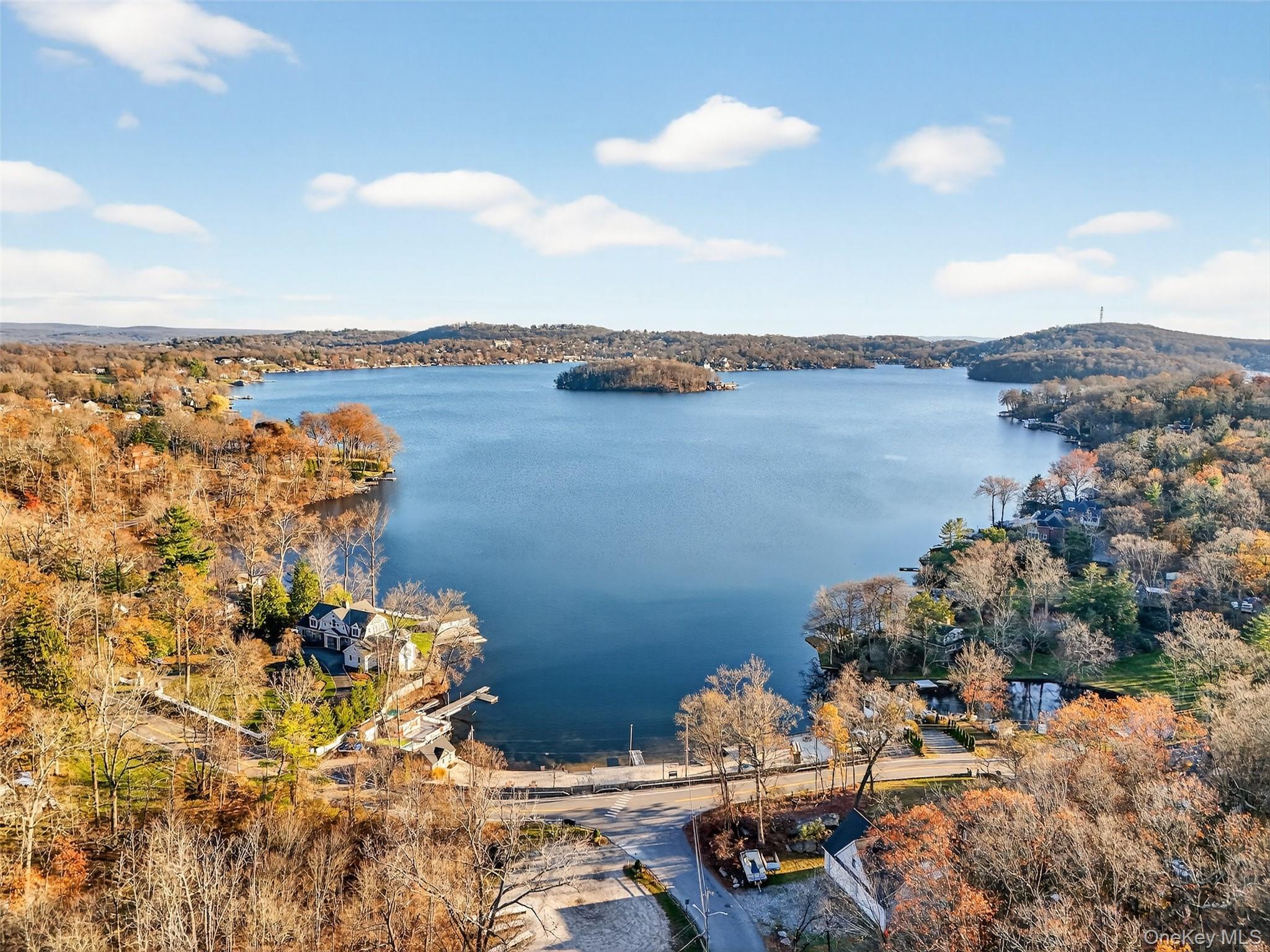 550 Beach Road Mahopac, NY 10541 - Photo 37 of 38 a view of a lake with a mountain view