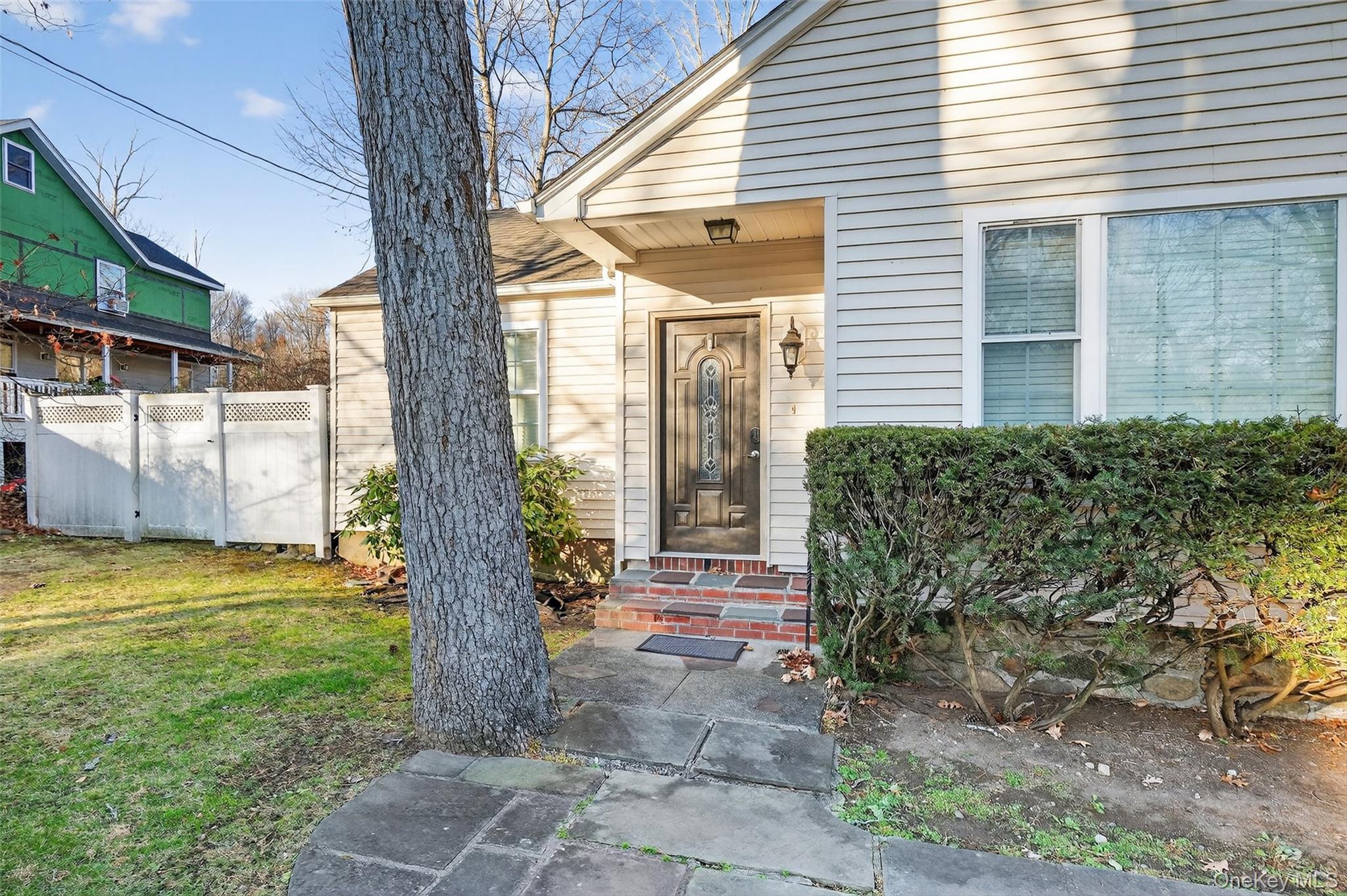 550 Beach Road Mahopac, NY 10541 - Photo 5 of 38 a front view of a house with garden