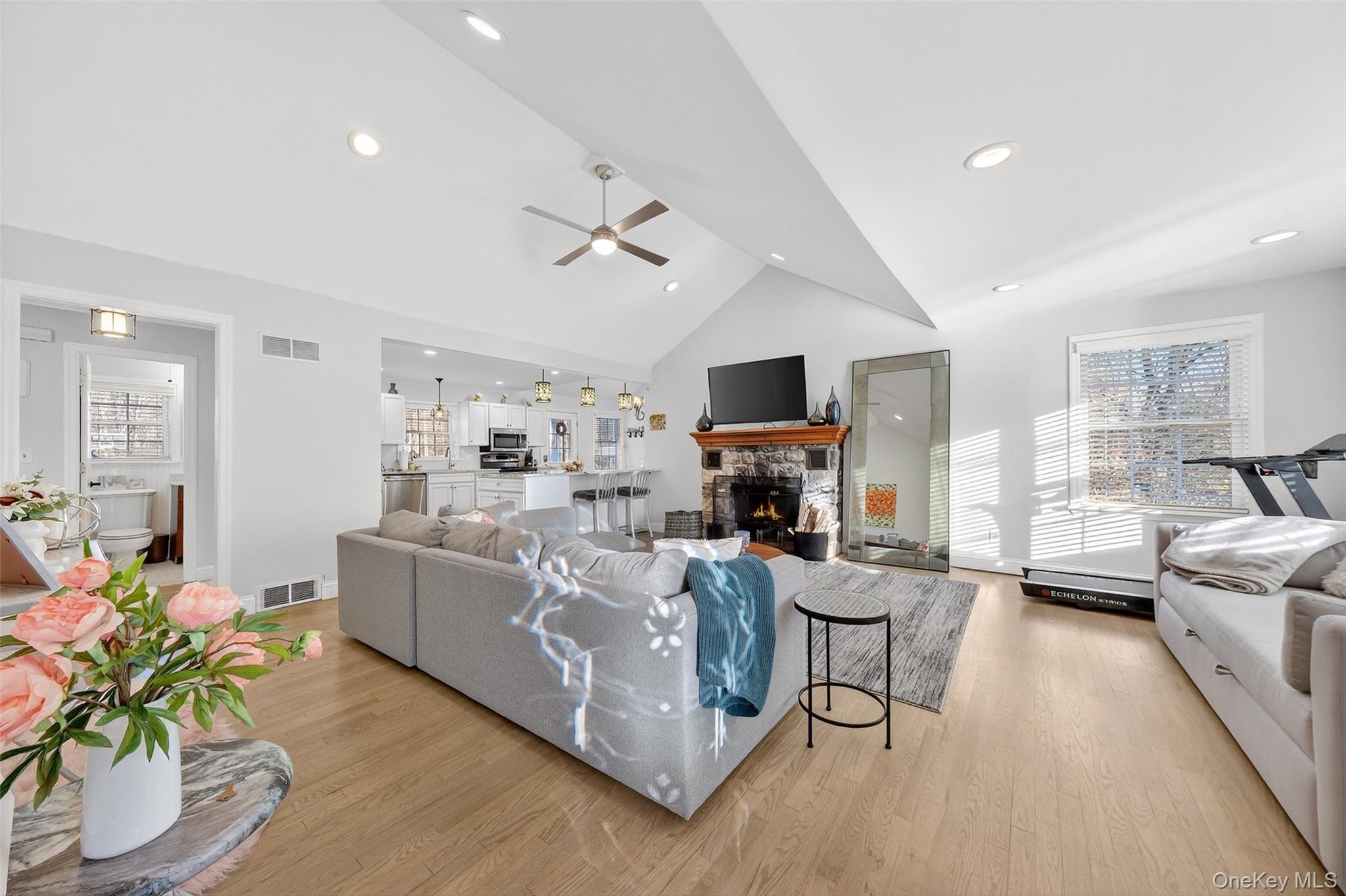 550 Beach Road Mahopac, NY 10541 - Photo 6 of 38 a living room with furniture fireplace and a large window