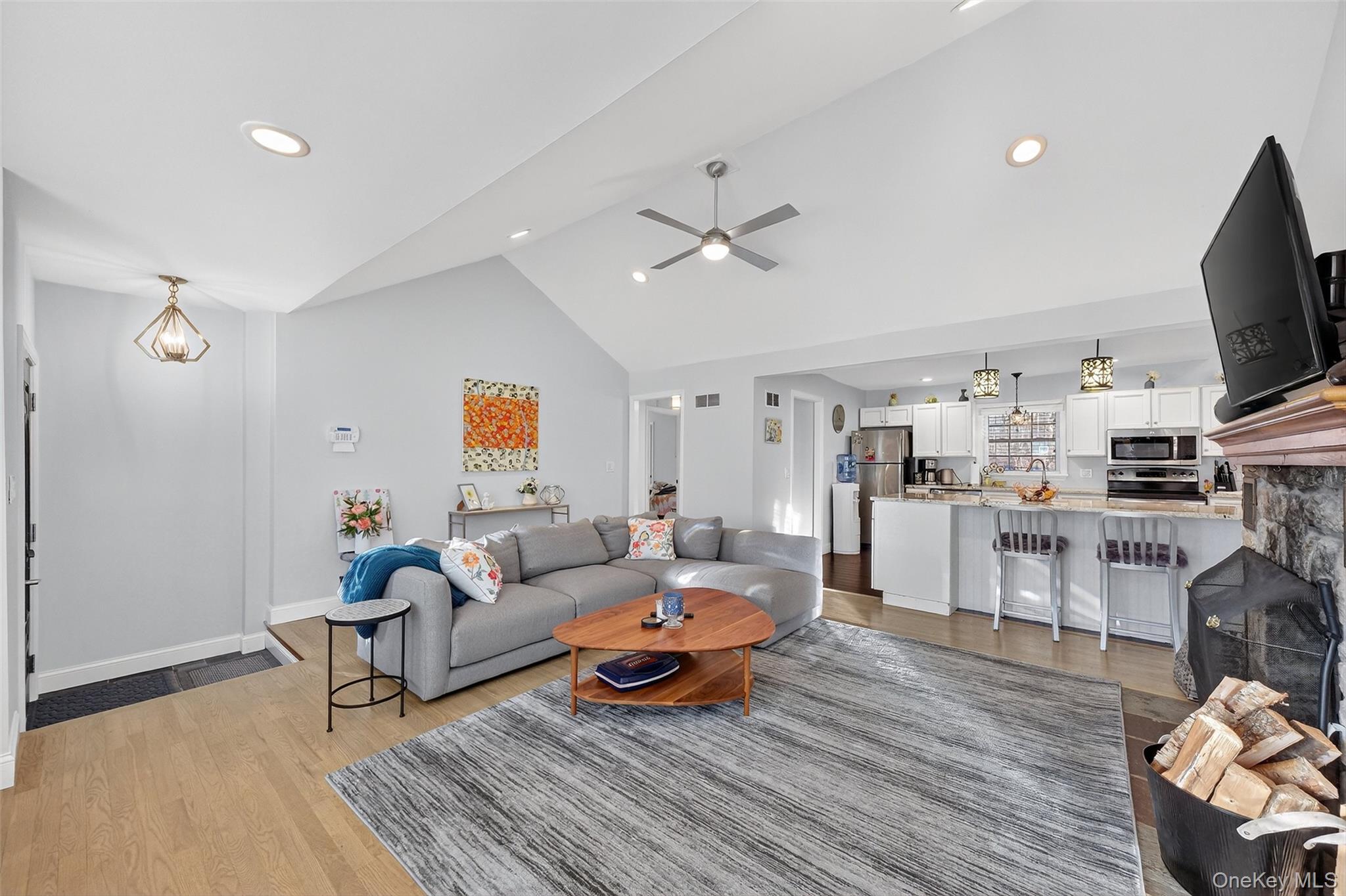 550 Beach Road Mahopac, NY 10541 - Photo 7 of 38 a living room with furniture and a flat screen tv