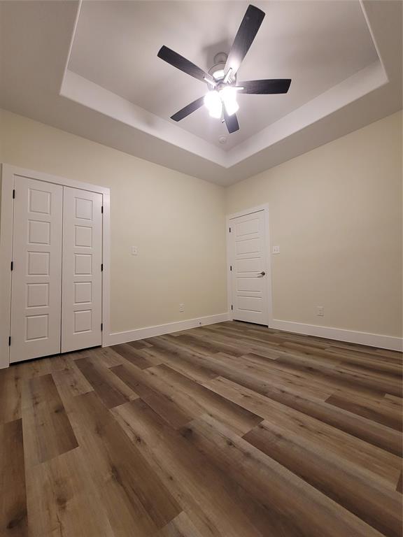 4825 Wichita Street Granbury, TX 76048 - Photo 27 of 30 wooden floor in an empty room
