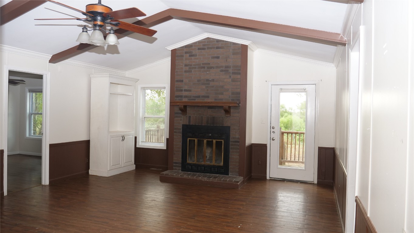 1504 Citation Circle, Unit D Del Valle, TX 78617 - Photo 1 of 25 a living room with furniture and a fireplace