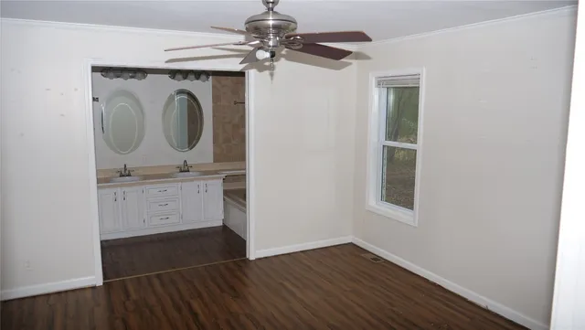 a utility room with cabinets dryer and washer