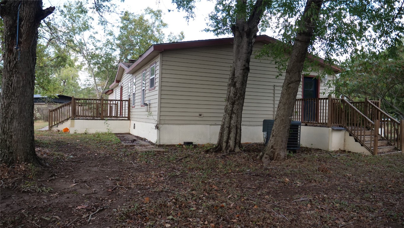 1504 Citation Circle, Unit D Del Valle, TX 78617 - Photo 20 of 25 a view of a house with a yard