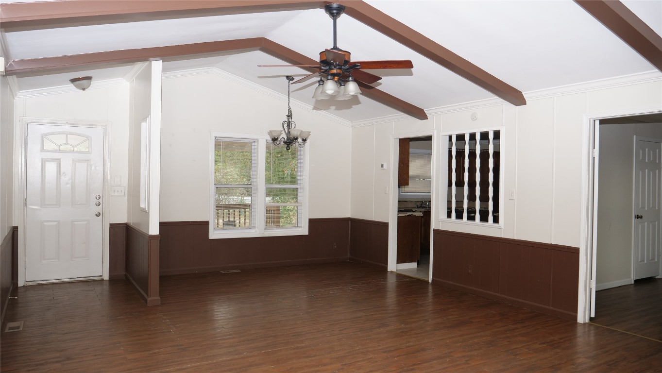 1504 Citation Circle, Unit D Del Valle, TX 78617 - Photo 2 of 25 a view of empty room with wooden floor and fan
