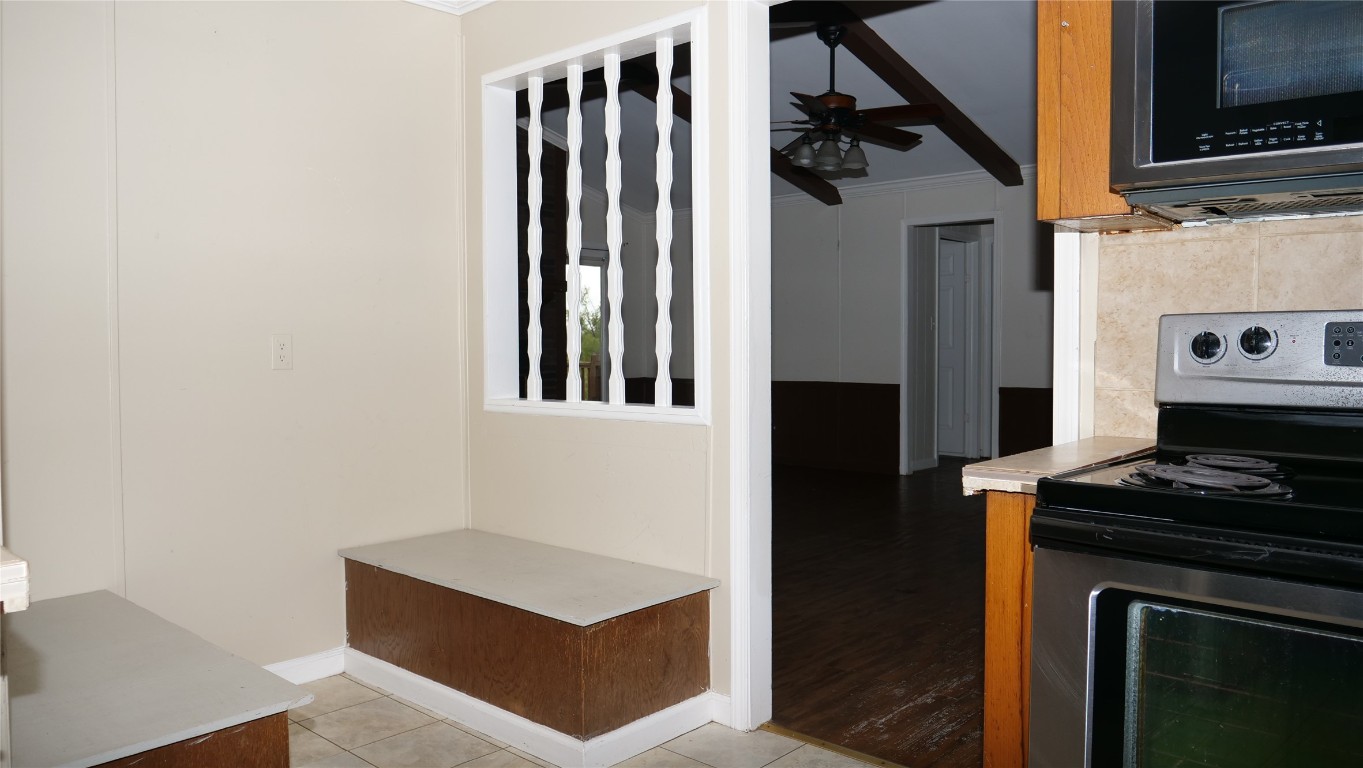 1504 Citation Circle, Unit D Del Valle, TX 78617 - Photo 8 of 25 a kitchen with stainless steel appliances a stove and a refrigerator