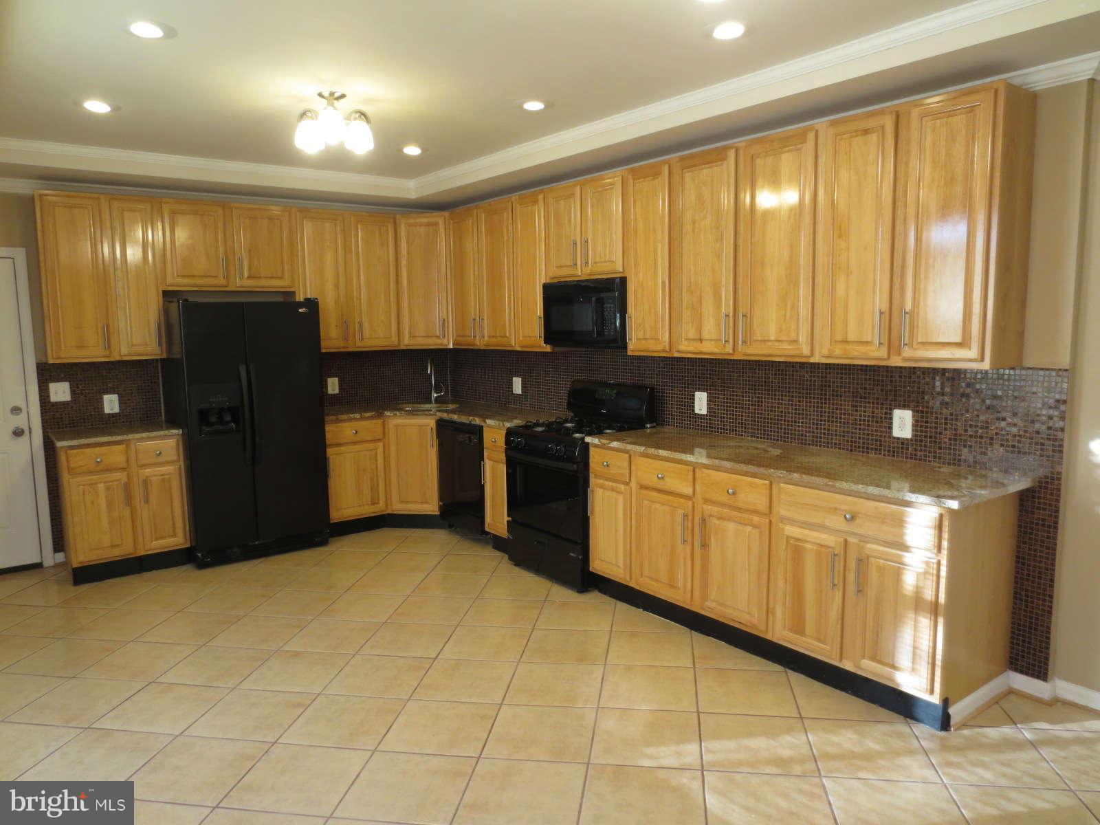 3122 Harford Road Baltimore, MD 21218 - Photo 1 of 21 Humongous Kitchen ! 42" cabinets!