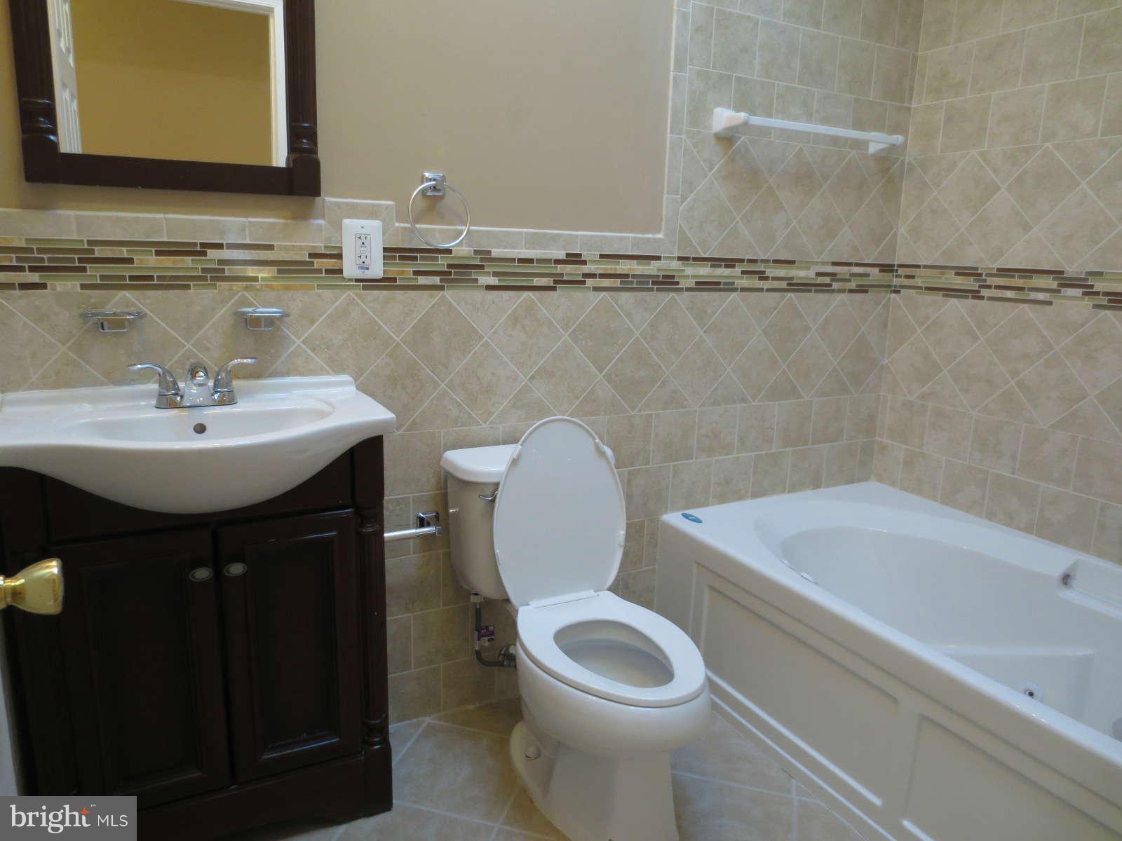 3122 Harford Road Baltimore, MD 21218 - Photo 13 of 21 Custom tilework in Master Bath
