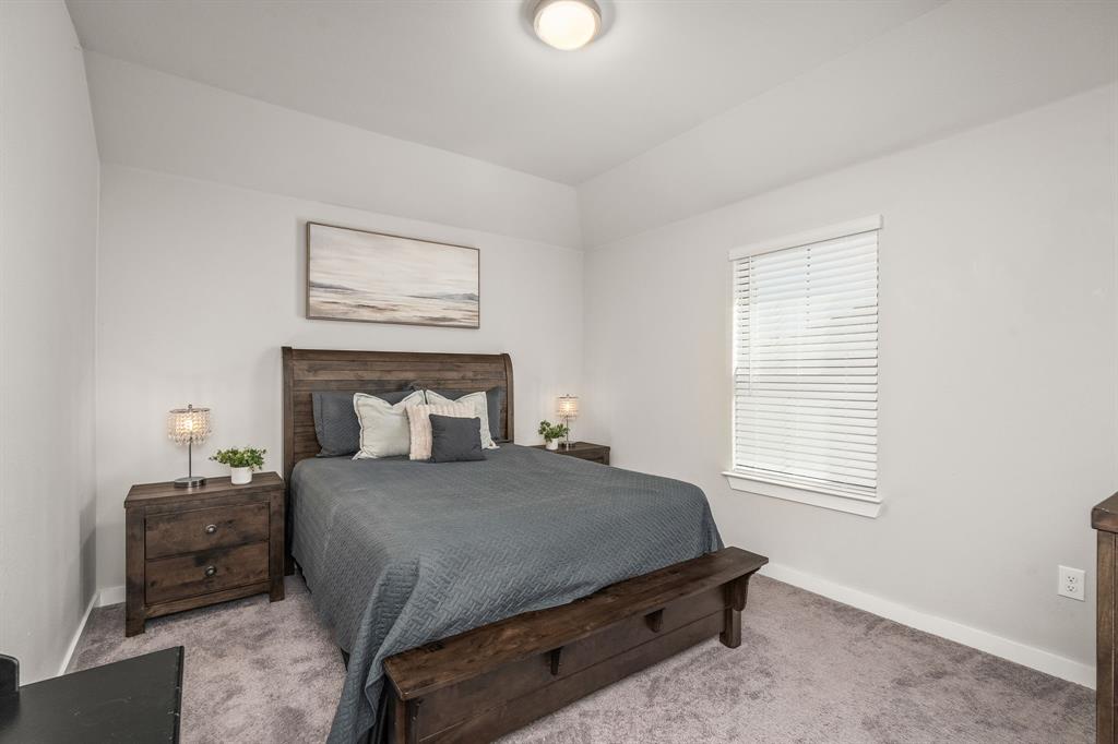 4017 Mapleleaf Pass Melissa, TX 75454 - Photo 24 of 32 a bedroom with a bed and a window