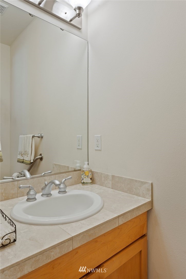 2013 Northeast 15th Street Renton, WA 98056 - Photo 11 of 29 a bedroom with a bed and a window