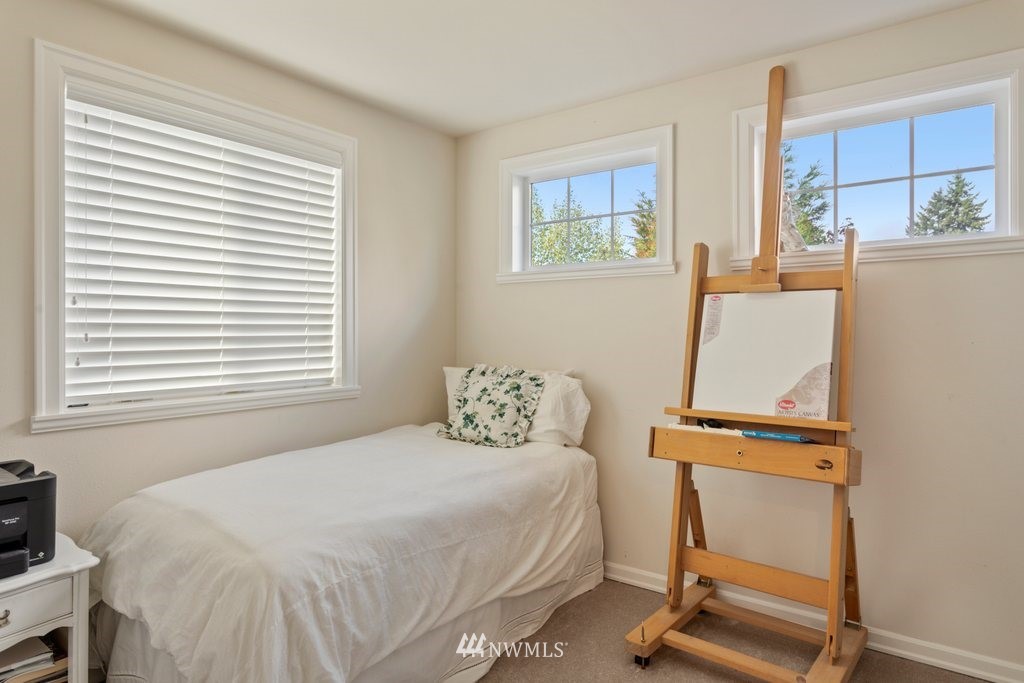 2013 Northeast 15th Street Renton, WA 98056 - Photo 12 of 29 a living room with furniture and a window