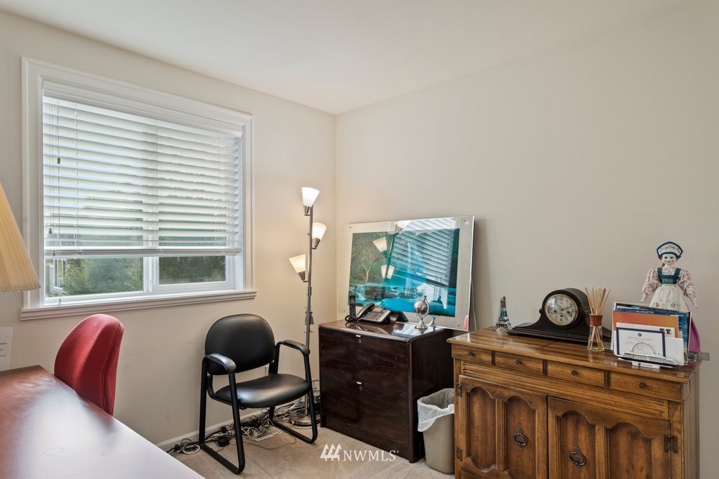 2013 Northeast 15th Street Renton, WA 98056 - Photo 13 of 29 a bathroom with a sink and a mirror