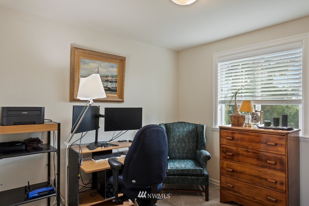 2013 Northeast 15th Street Renton, WA 98056 - Photo 15 of 29 a bedroom with a large bed and a window