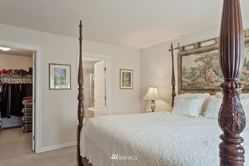 2013 Northeast 15th Street Renton, WA 98056 - Photo 18 of 29 a bedroom with a bed and a dresser