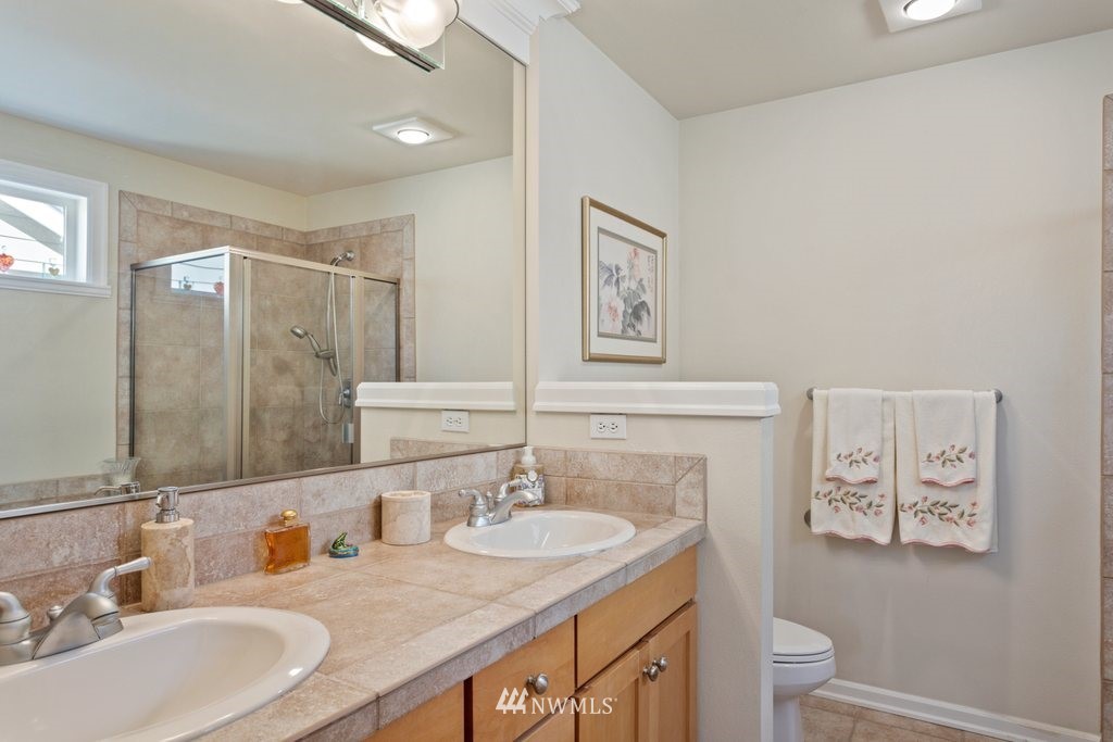 2013 Northeast 15th Street Renton, WA 98056 - Photo 20 of 29 a bathroom with a shower and a sink