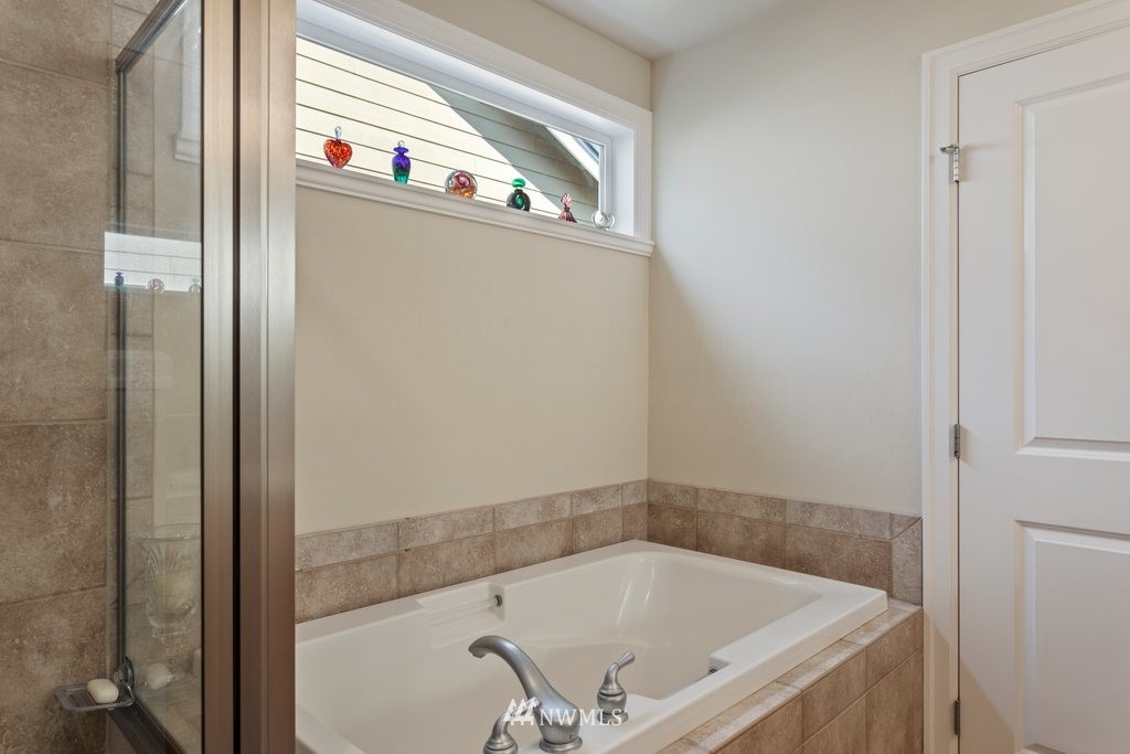 2013 Northeast 15th Street Renton, WA 98056 - Photo 22 of 29 a view of walk in closet with clothes