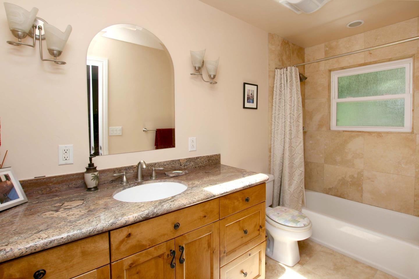 1595 River Road Brookdale, CA 95005 - Photo 17 of 50 a bathroom with a granite countertop sink toilet and shower