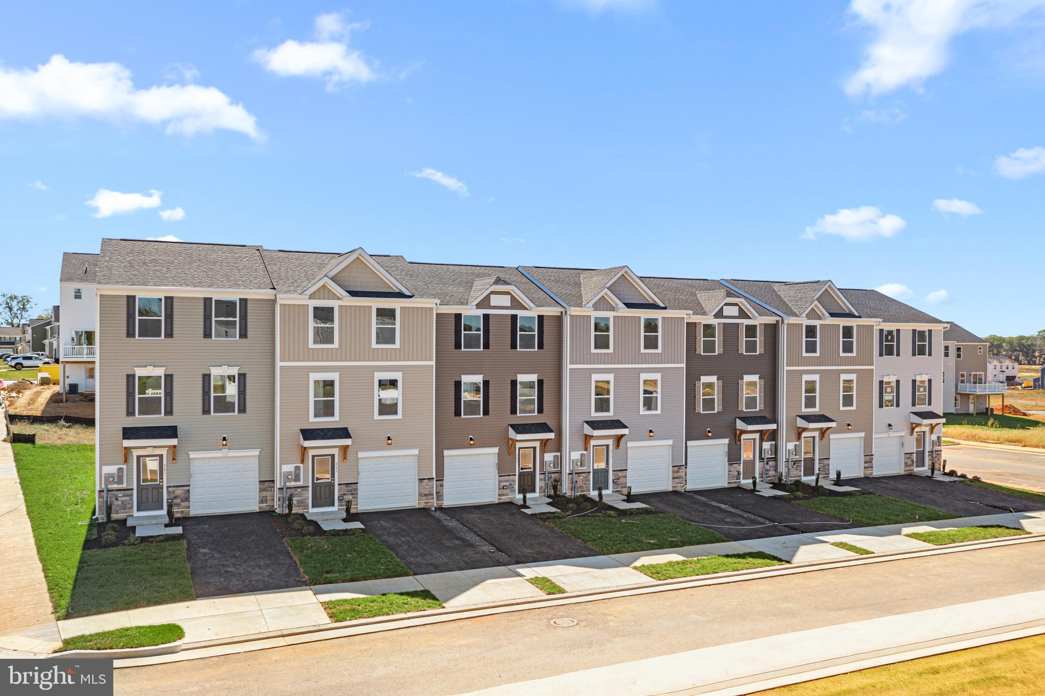 177 Huntwell W Avenue Ranson, WV 25438 - Photo 4 of 20 a front view of a building with street view