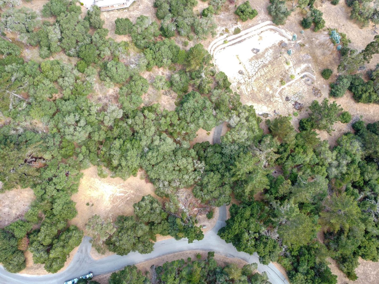 8730 Eagles Roost Road Salinas, CA 93907 - Photo 9 of 12 a backyard of a house with a yard and lake view