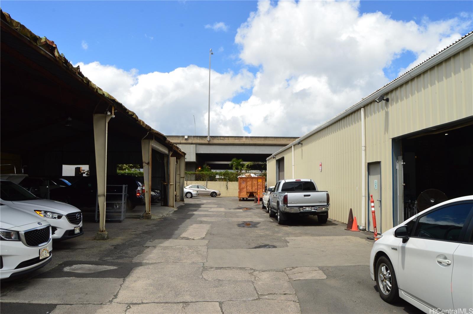 2726 Waiwai Loop Honolulu, HI 96819 - Photo 11 of 17 a car parked in the parking lot