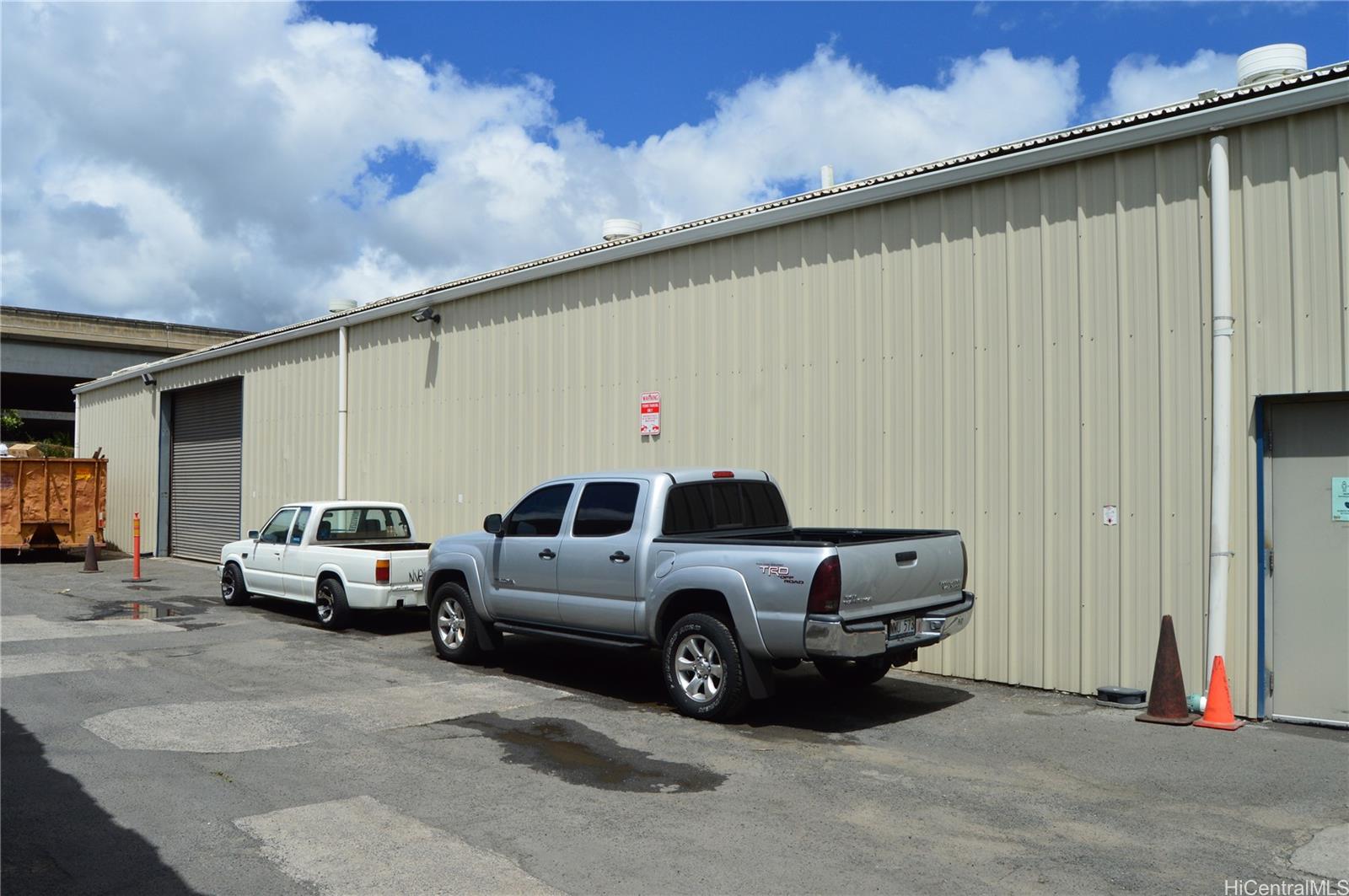 2726 Waiwai Loop Honolulu, HI 96819 - Photo 13 of 17 a car parked in front of a house