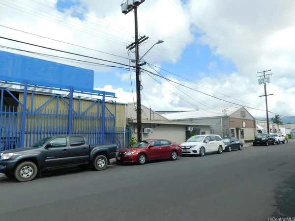 a view of a car parked in front of a building