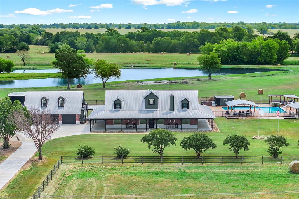 733 Rains County Road 1430 Point, TX 75472 - Photo 2 of 40 a view of a big house with a big yard and large trees
