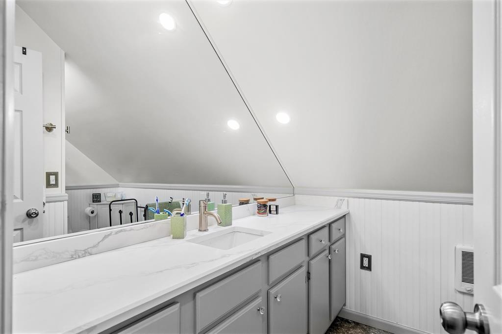 733 Rains County Road 1430 Point, TX 75472 - Photo 26 of 40 a bathroom with a sink and a mirror