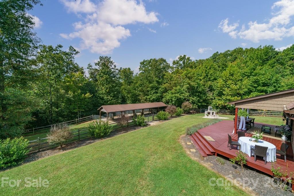418 Devotion Farm Way Thurmond, NC 28683 - Photo 40 of 44 a view of a backyard with sitting area