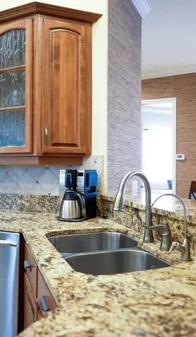 a spacious bathroom with a shower and a sink