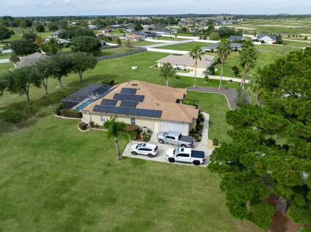 a view of swimming pool with a yard