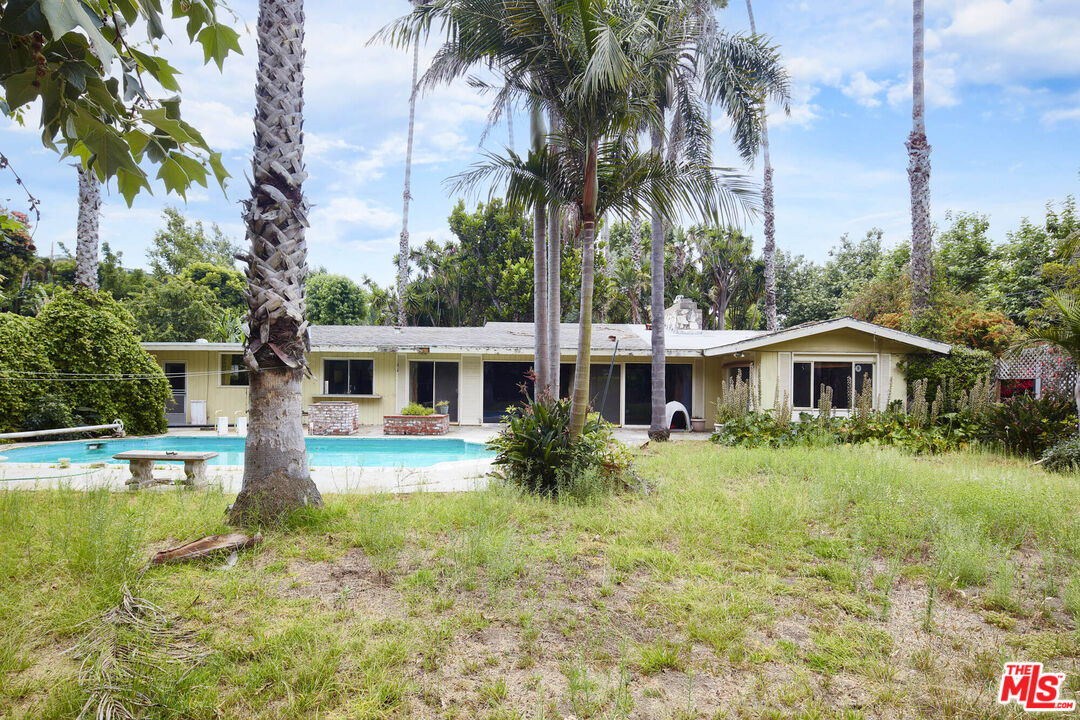 6414 Bonsall Drive Malibu, CA 90265 - Photo 16 of 75 a front view of a house with garden