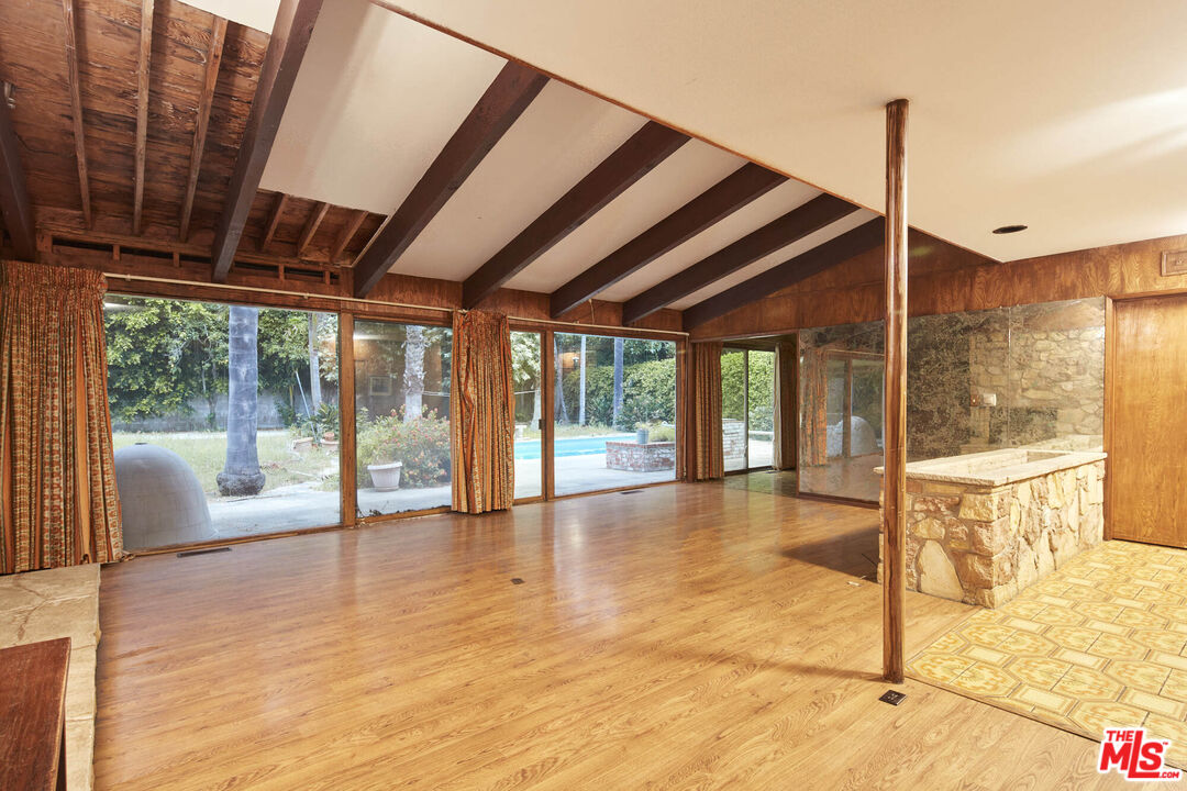 6414 Bonsall Drive Malibu, CA 90265 - Photo 20 of 75 a view of empty room with floor to ceiling windows