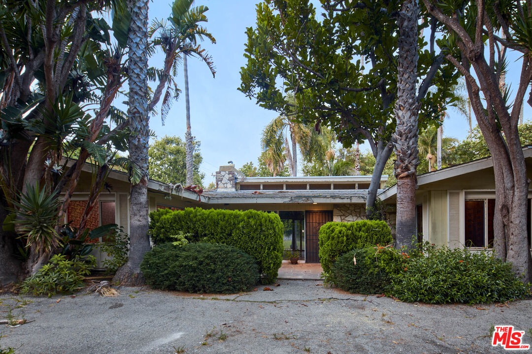 6414 Bonsall Drive Malibu, CA 90265 - Photo 35 of 75 a front view of a house with garden