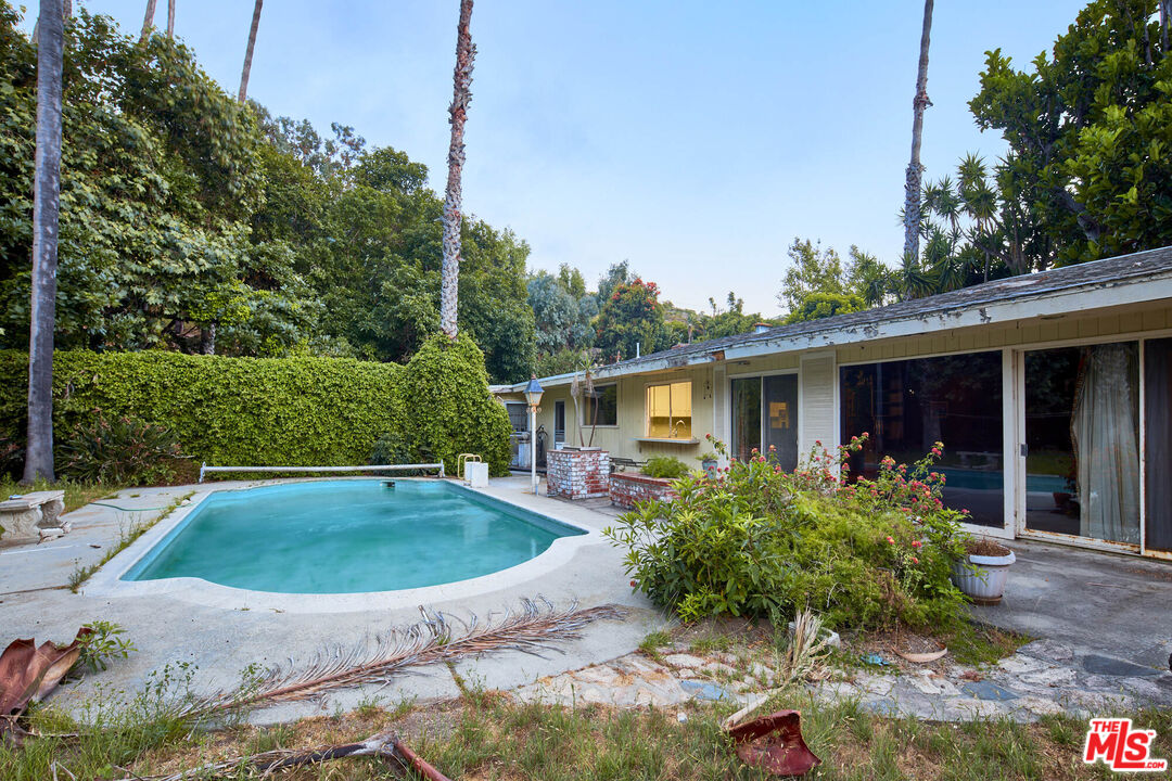 6414 Bonsall Drive Malibu, CA 90265 - Photo 37 of 75 a front view of a house with garden