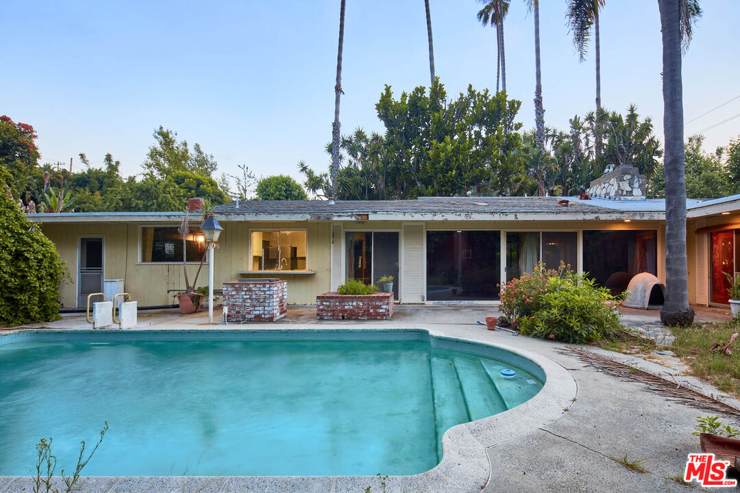 6414 Bonsall Drive Malibu, CA 90265 - Photo 38 of 75 a front view of house with yard and outdoor seating