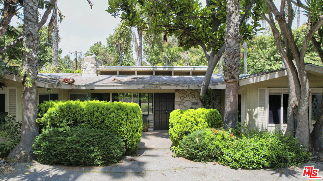 6414 Bonsall Drive Malibu, CA 90265 - Photo 4 of 75 front view of a house with a garden