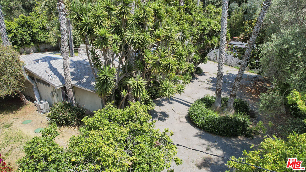 6414 Bonsall Drive Malibu, CA 90265 - Photo 50 of 75 view of a house with a yard