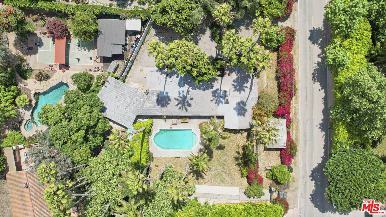 6414 Bonsall Drive Malibu, CA 90265 - Photo 5 of 75 an aerial view of a house with yard and swimming pool